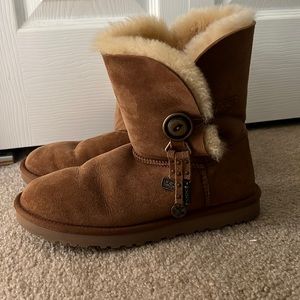 Ugg boots size 8, chestnut color, no stains, one button with charms on side